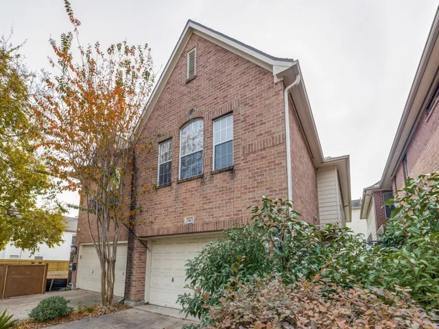 a brick building with a large windows