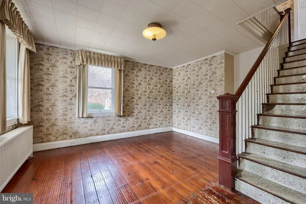 a bathroom with a sink vanity and a mirror