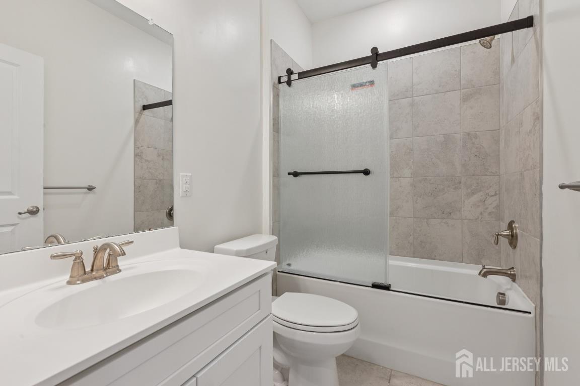 517 Tavern Road Monroe Township, NJ 08831 - Photo 18 of 27 a bathroom with a sink toilet and shower