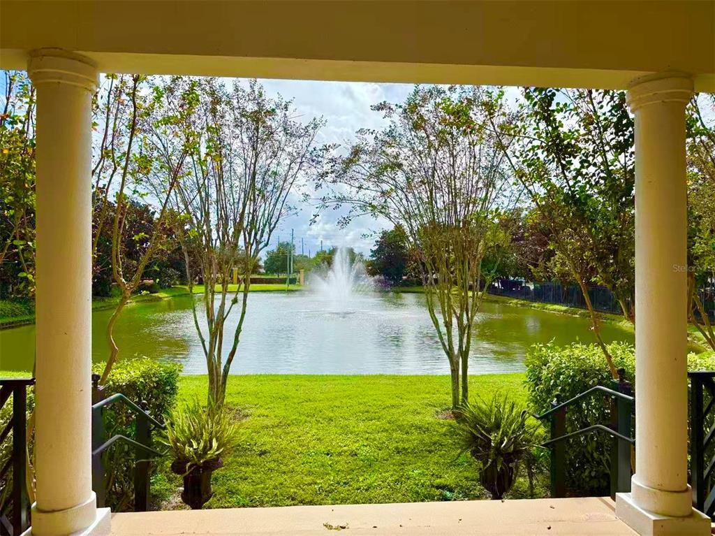 3751 Conroy Road, Unit 2334 Orlando, FL 32839 - Photo 12 of 20 a view of a garden from a lake