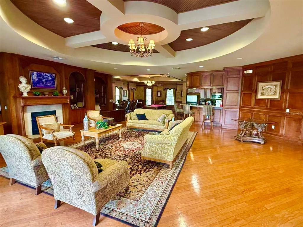 3751 Conroy Road, Unit 2334 Orlando, FL 32839 - Photo 18 of 20 a living room with fireplace furniture and a flat screen tv