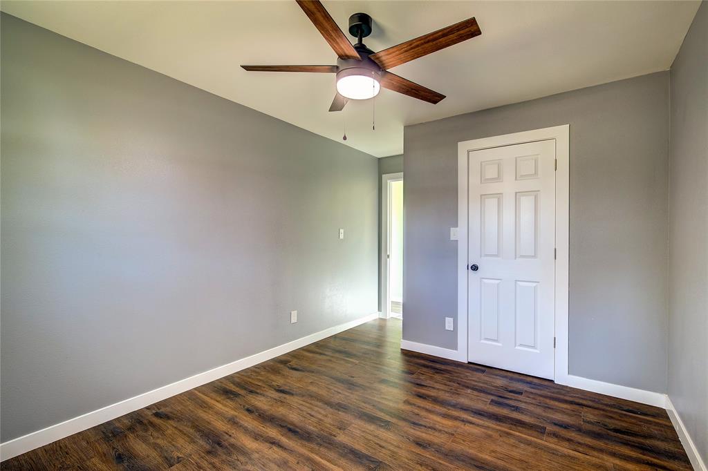 520 North 1st Street Point, TX 75472 - Photo 17 of 34 wooden floor in an empty room