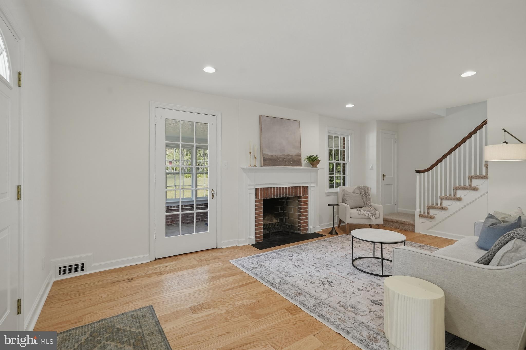 800 Pleasant Hill Road Wallingford, PA 19086 - Photo 3 of 34 a living room with furniture and a fireplace
