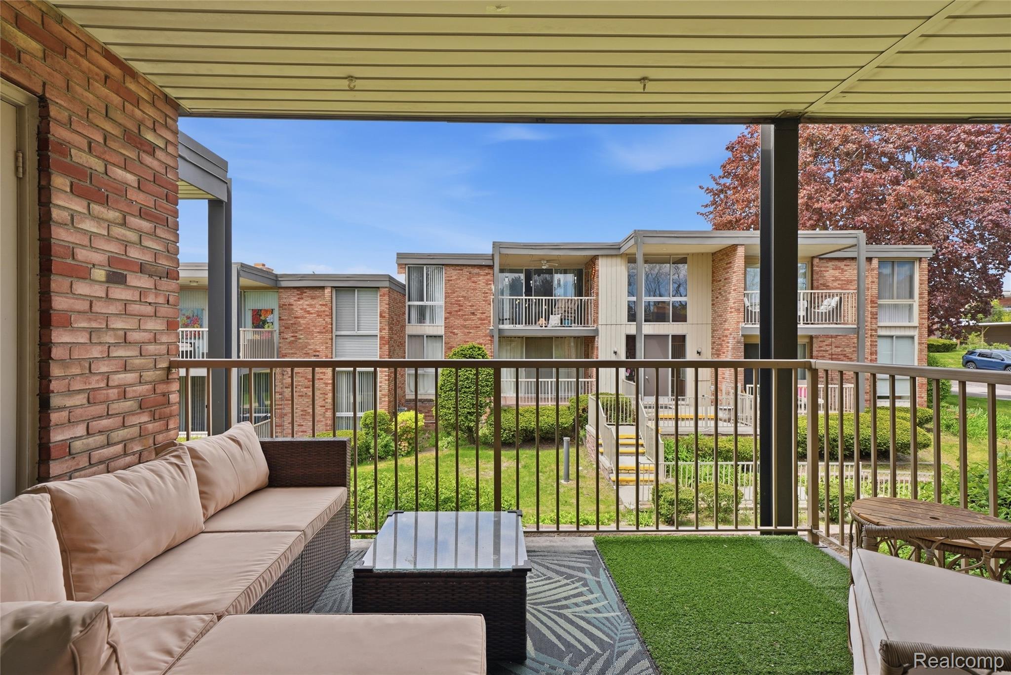 4041 West Maple Road, Unit E203 Bloomfield Hills, MI 48301 - Photo 23 of 25 Balcony with a grill