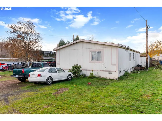 a view of a city with mountains in the background