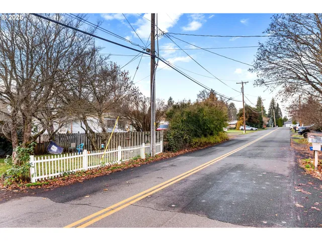 a view of a street with houses