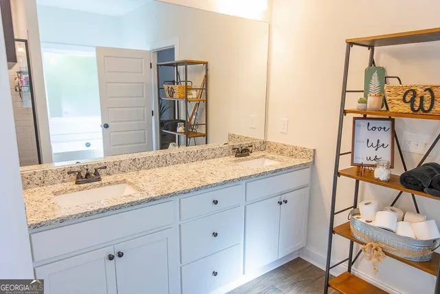 a view of a room with wooden walls