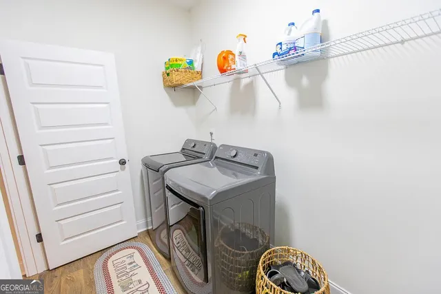 a view of backyard with swimming pool and outdoor seating