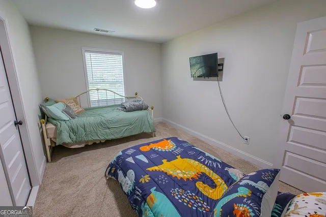 a view of swimming pool with seating space