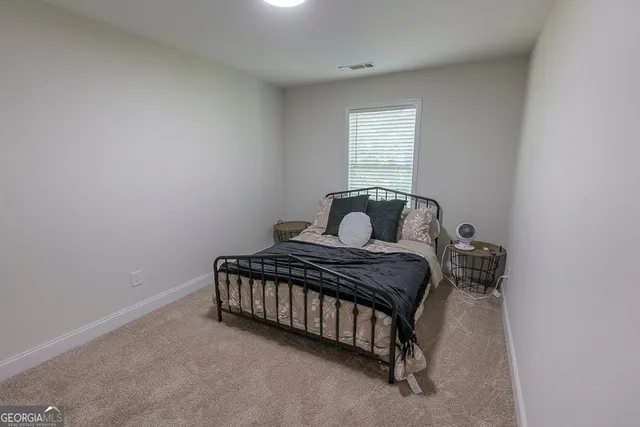 a view of a swimming pool with a lounge chair