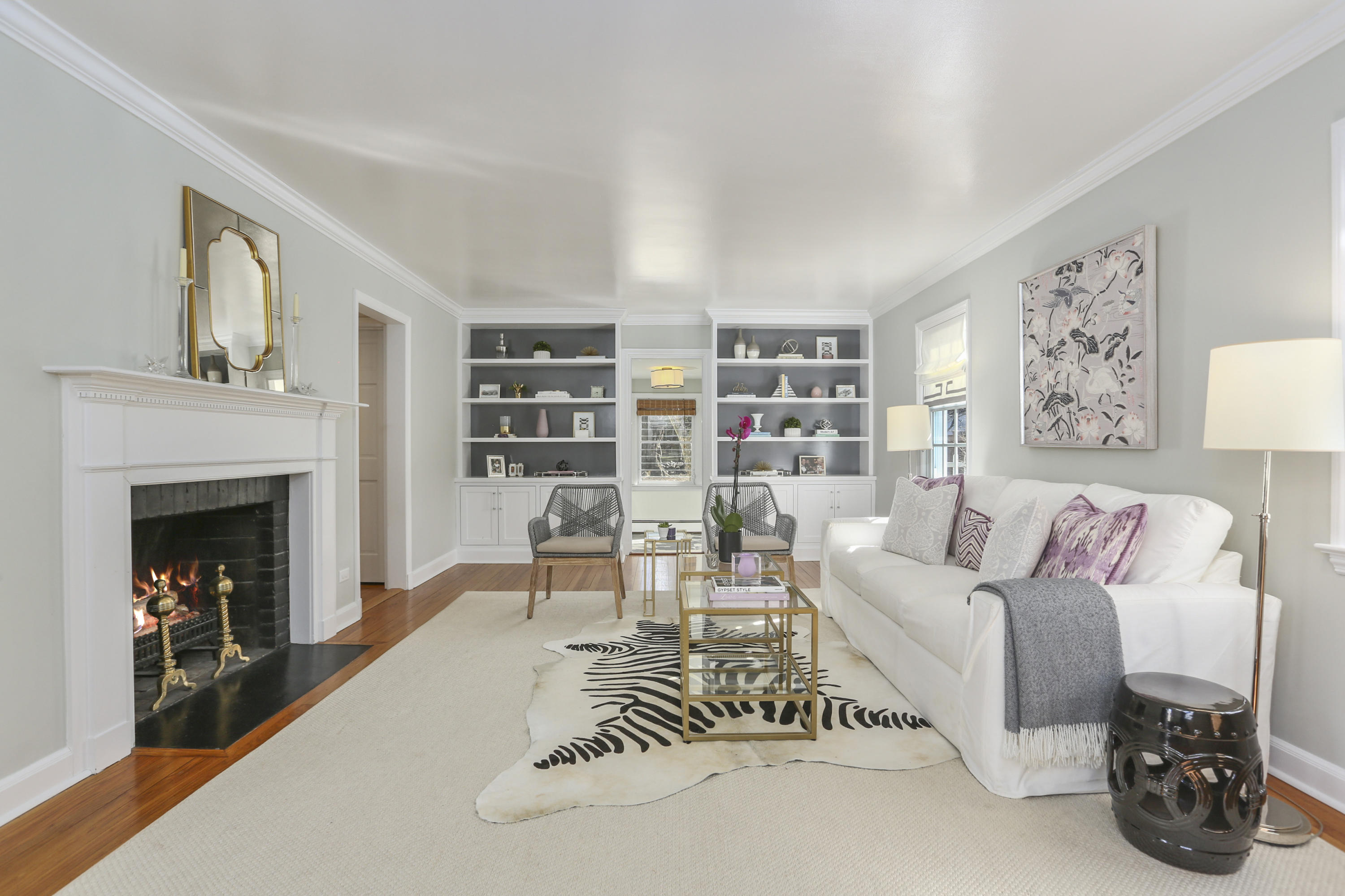 4 Colony Road Darien, CT 06820 - Photo 3 of 36 a living room with furniture and a fireplace