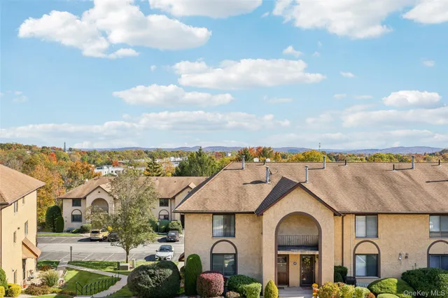 a view of multiple houses with a outdoor space