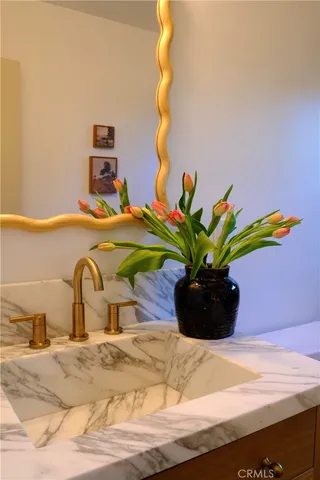 a vase of flowers sitting on a table