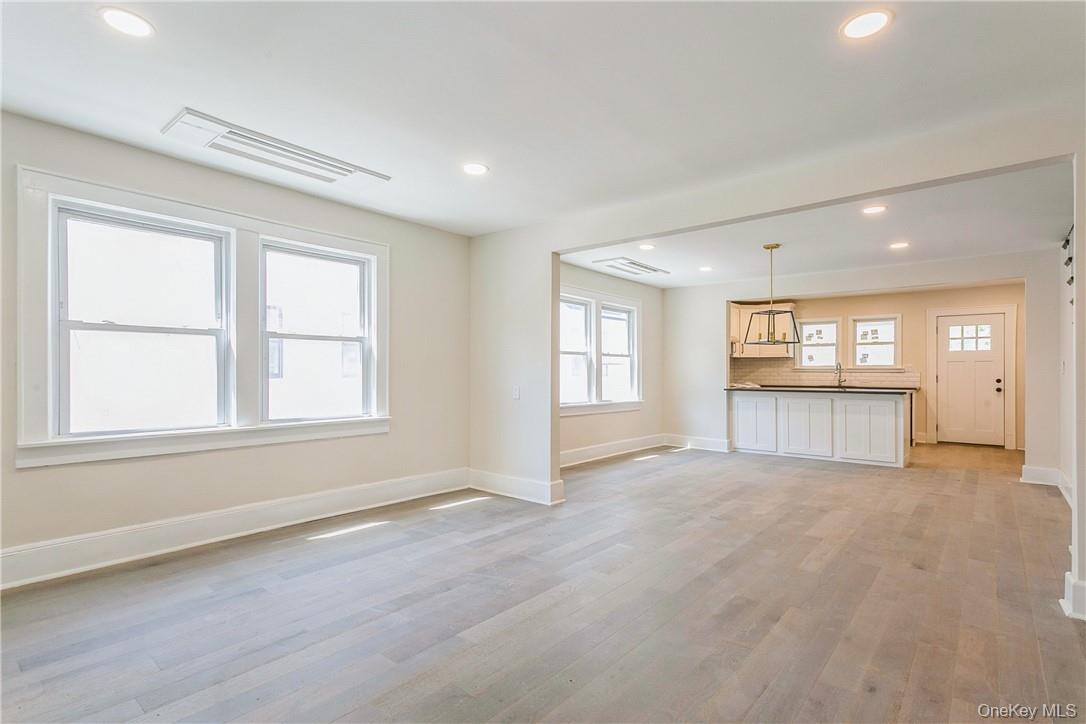 215 Purchase Street, Unit A Rye, NY 10580 - Photo 2 of 21 Living RM w/FP - Dining Area - Kitchen