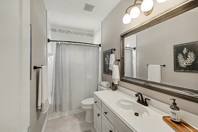 a picture of a bathroom with a sink