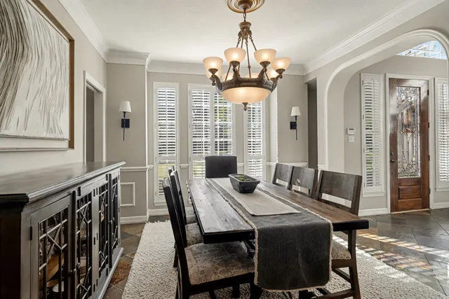 a work room with furniture and a window