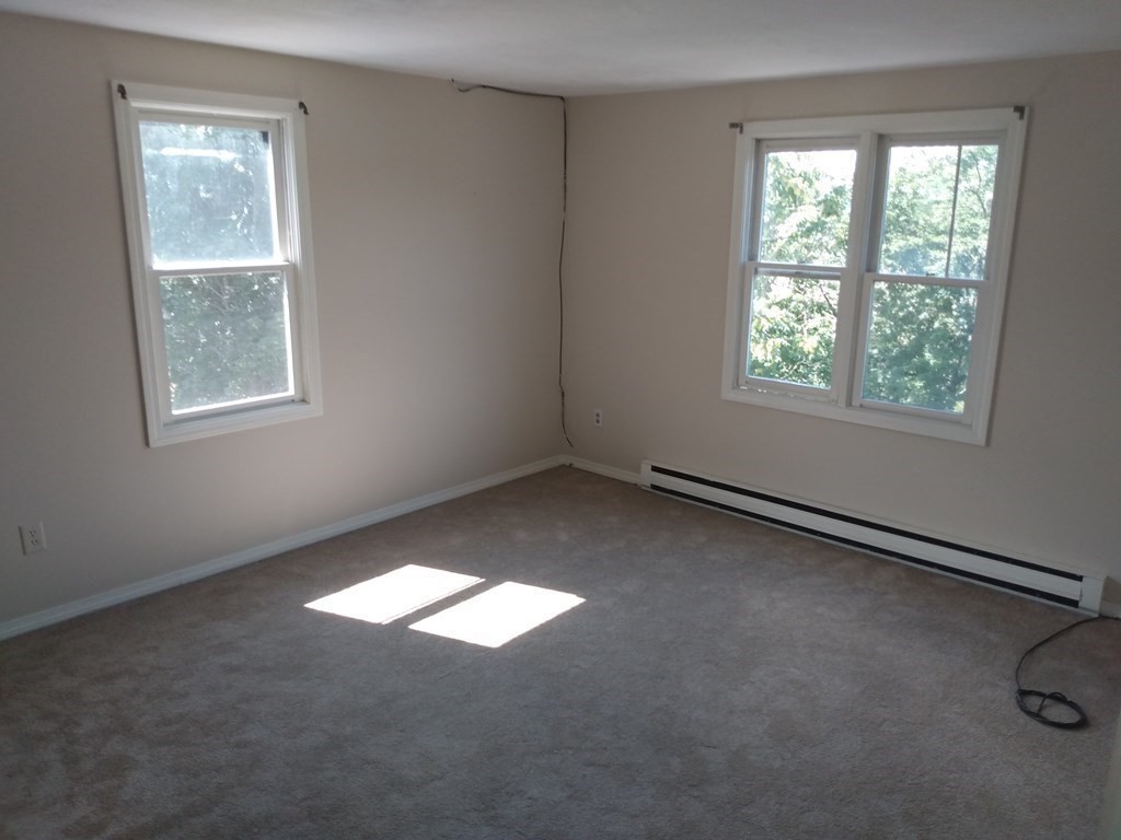 7 Gibbs Street, Unit 9 Worcester, MA 01607 - Photo 8 of 11 an empty room with a window