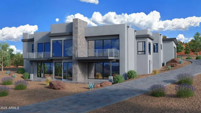 a front view of a house with sitting area and fire pit