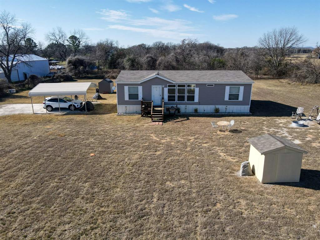 7256 Johnson Road Granbury, TX 76049 - Photo 6 of 40 Manufactured / mobile home with a carport