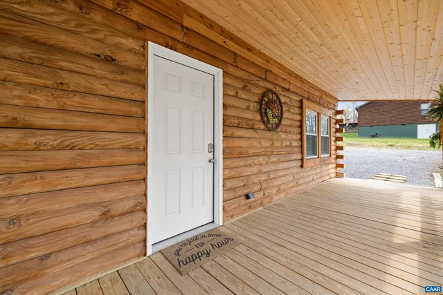 a view of a livingroom with furniture and wooden floor