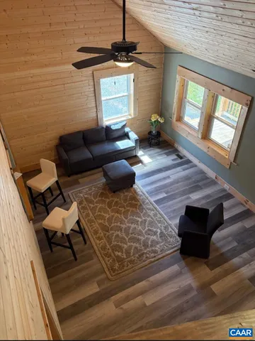 a view of a swimming pool with a yard