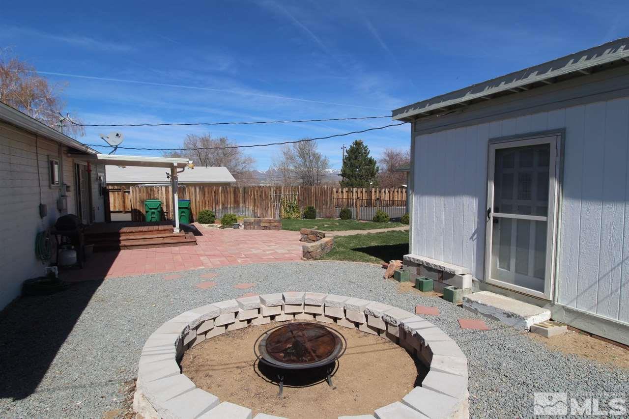 8715 Aquifer Way Reno, NV 89506 - Photo 14 of 18 a view of a house with a patio