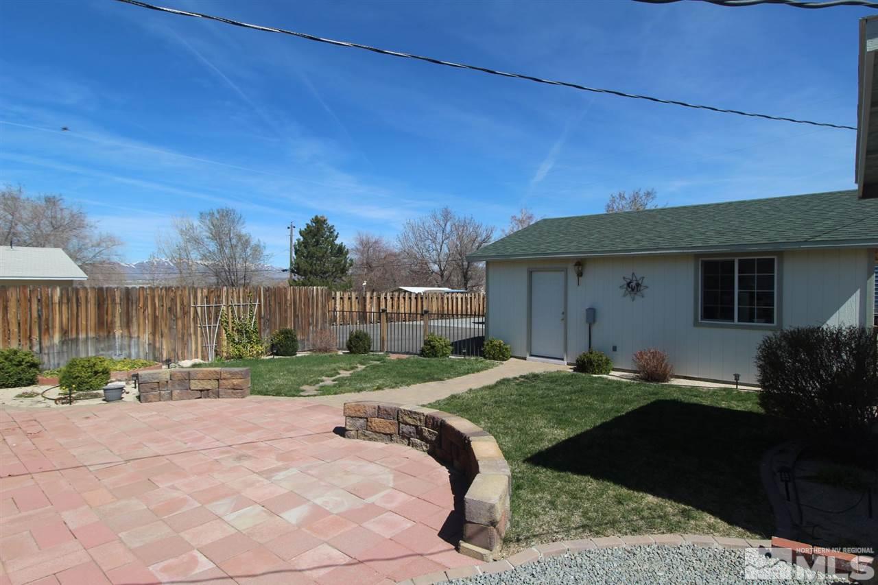 8715 Aquifer Way Reno, NV 89506 - Photo 15 of 18 a house view with a garden space