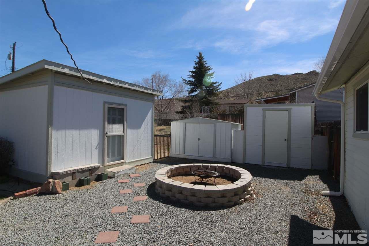 8715 Aquifer Way Reno, NV 89506 - Photo 16 of 18 a view of a house with backyard