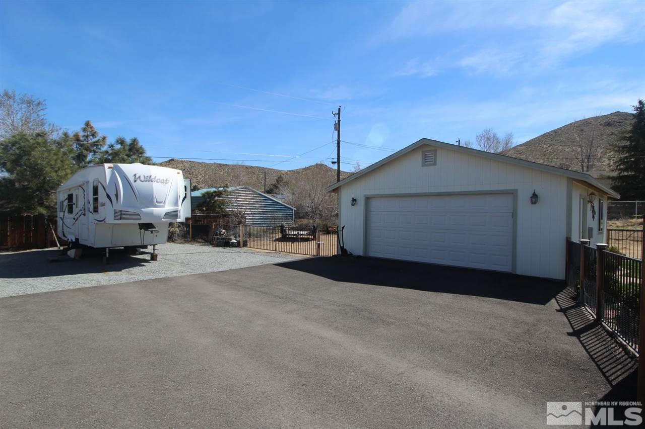 8715 Aquifer Way Reno, NV 89506 - Photo 17 of 18 a car parked in front of a house