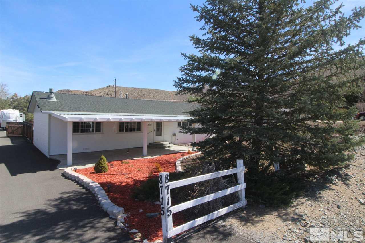 8715 Aquifer Way Reno, NV 89506 - Photo 18 of 18 a view of a house with a yard