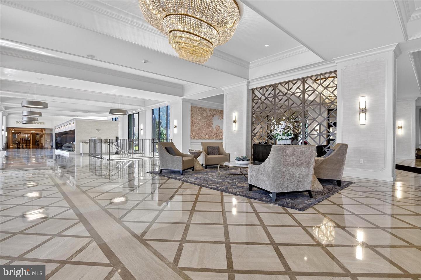 5225 Pooks Hill Road, Unit 303S Bethesda, MD 20814 - Photo 17 of 19 Elegant lobby with stunning chandelier.