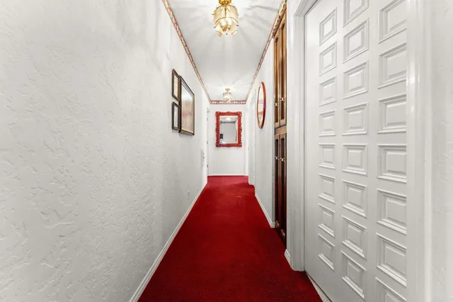 a living room with furniture a ceiling fan and a fireplace
