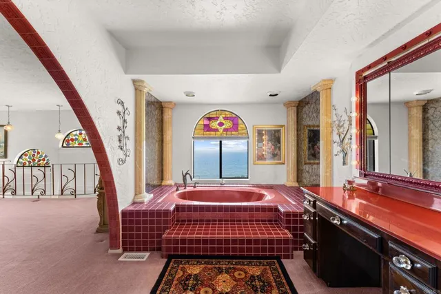 a view of a hallway with washer and dryer