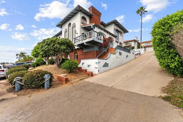 a view of a balcony with wooden floor
