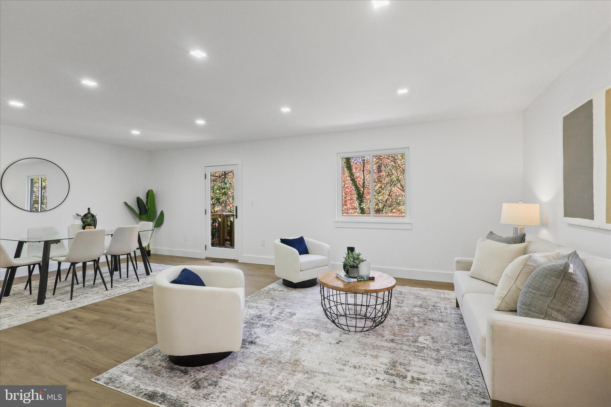 11152 Forest Edge Drive Reston, VA 20190 - Photo 12 of 57 a living room with furniture and wooden floor