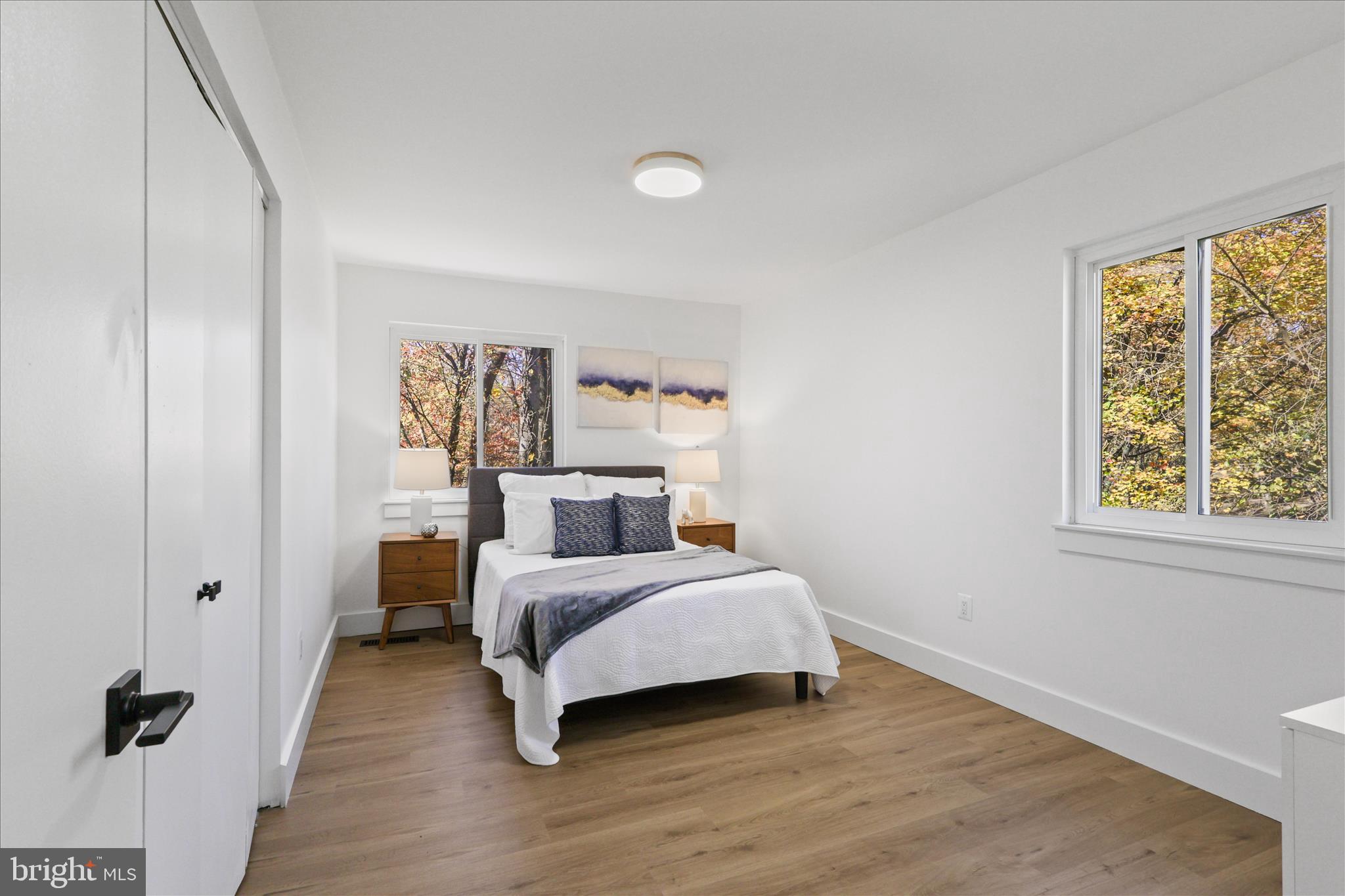 11152 Forest Edge Drive Reston, VA 20190 - Photo 24 of 57 a bedroom with a bed and a window