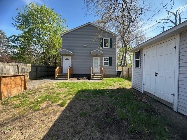 15-17 Otis Court, Unit 15 Springfield, MA 01119 - Photo 1 of 16 a front view of house with yard