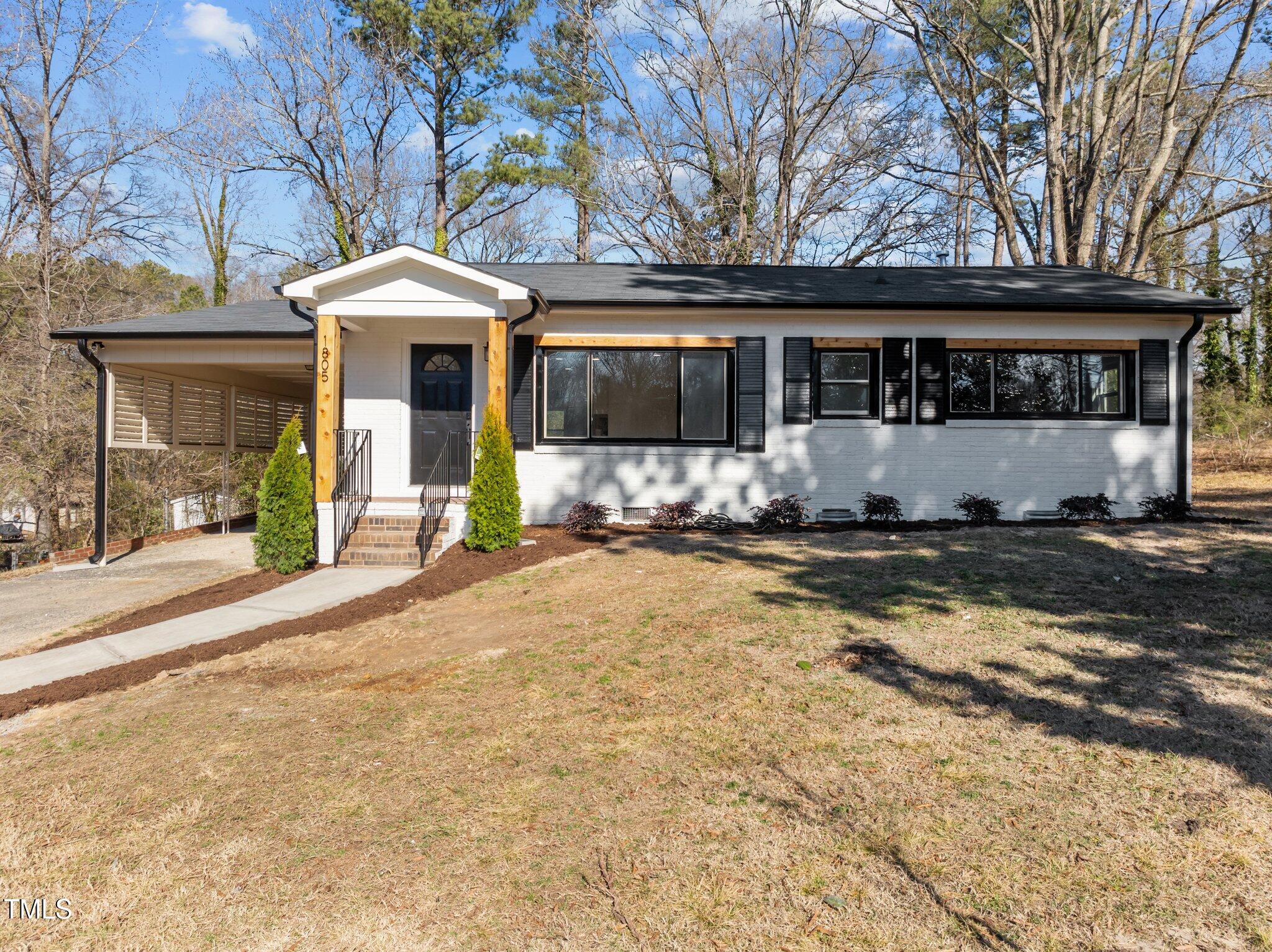 1805 Pritchard Place Durham, NC 27707 - Photo 5 of 46 a front view of house with yard