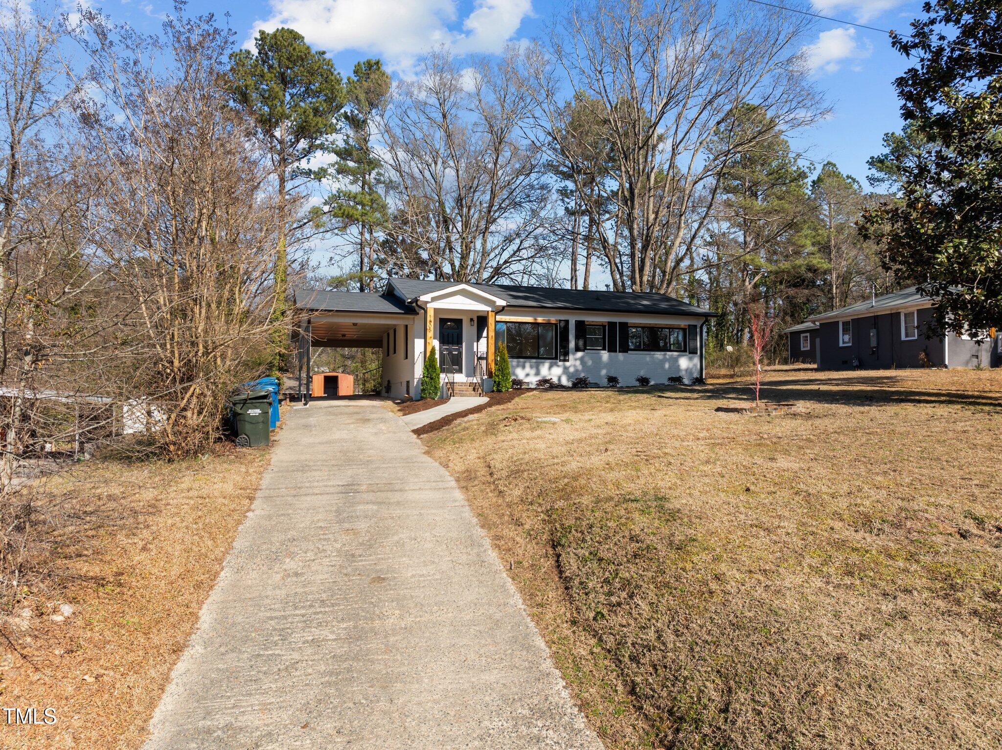 1805 Pritchard Place Durham, NC 27707 - Photo 6 of 46 a front view of a building with street view