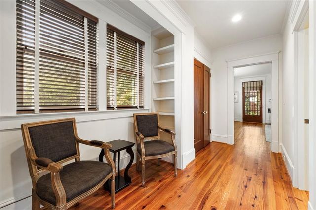 a view of a livingroom with furniture and wooden floor