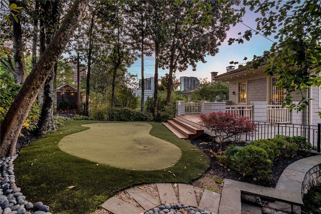 121 17th Street Northeast Atlanta, GA 30309 - Photo 47 of 53 a view of backyard with green space