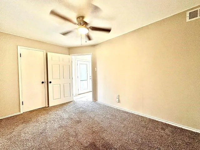 a bathroom with a sink a toilet and vanity