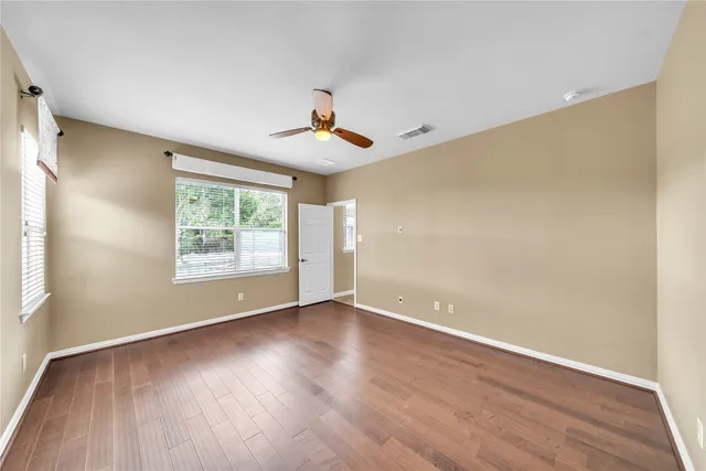 a view of hall way with furniture