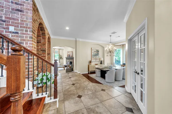 a view of a living room and balcony