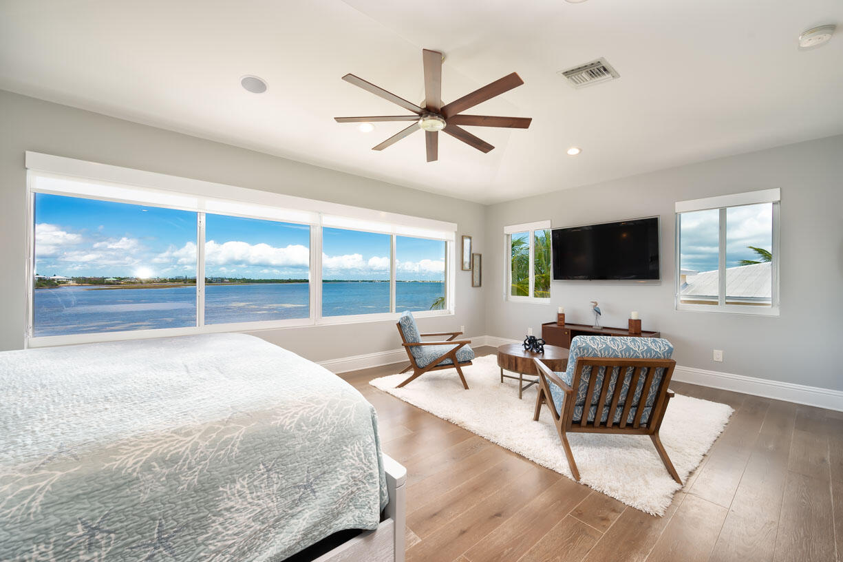 14 East Ocean Drive Marathon, FL 33050 - Photo 13 of 48 a living room with furniture and a flat screen tv