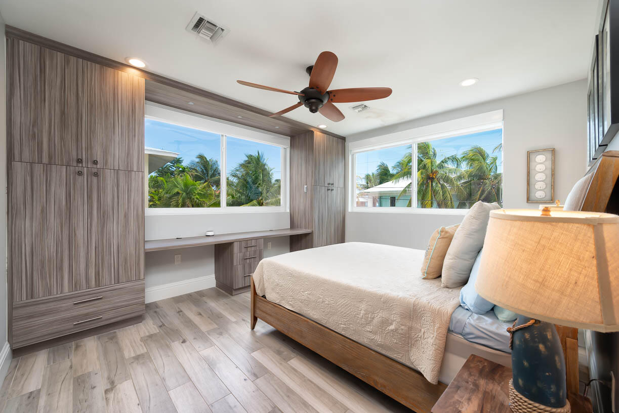 14 East Ocean Drive Marathon, FL 33050 - Photo 20 of 48 a living room with a bed furniture and a large window