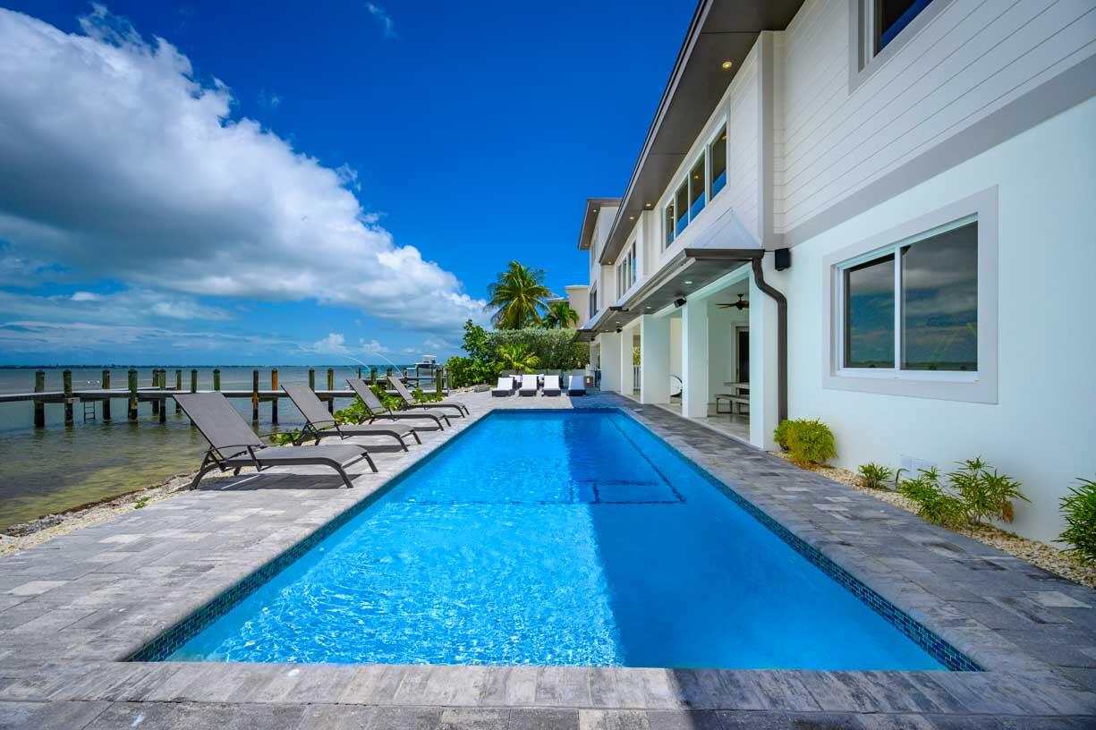 14 East Ocean Drive Marathon, FL 33050 - Photo 25 of 48 a view of a house with swimming pool and sitting area