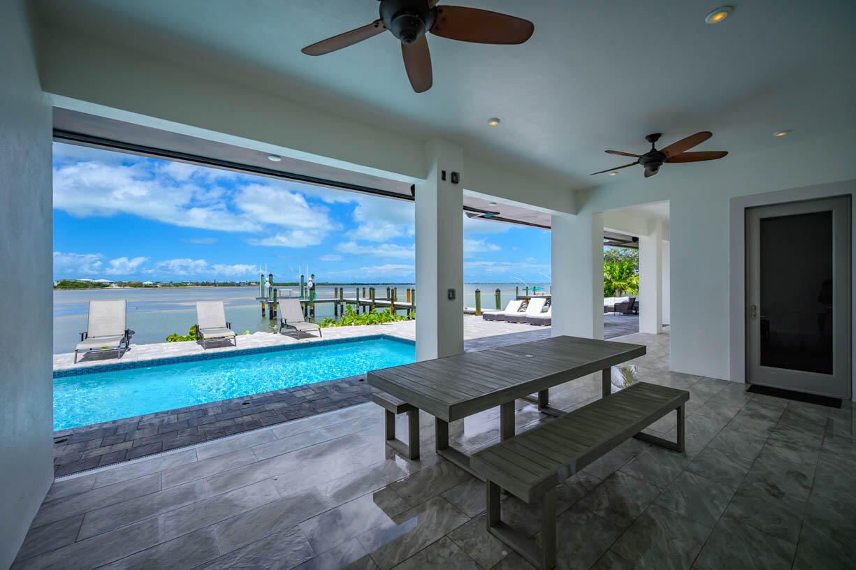 14 East Ocean Drive Marathon, FL 33050 - Photo 29 of 48 a view of a kitchen with a table and chairs
