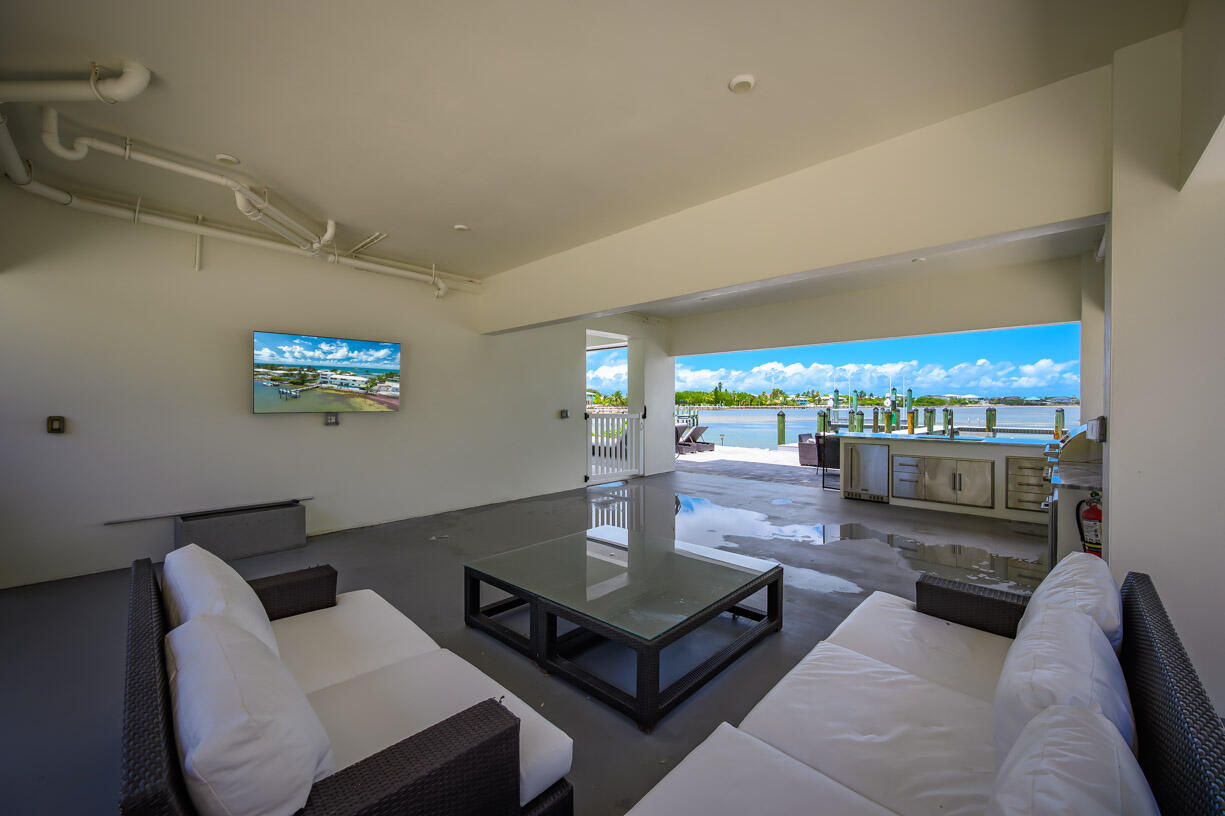 14 East Ocean Drive Marathon, FL 33050 - Photo 30 of 48 a living room with furniture and a table