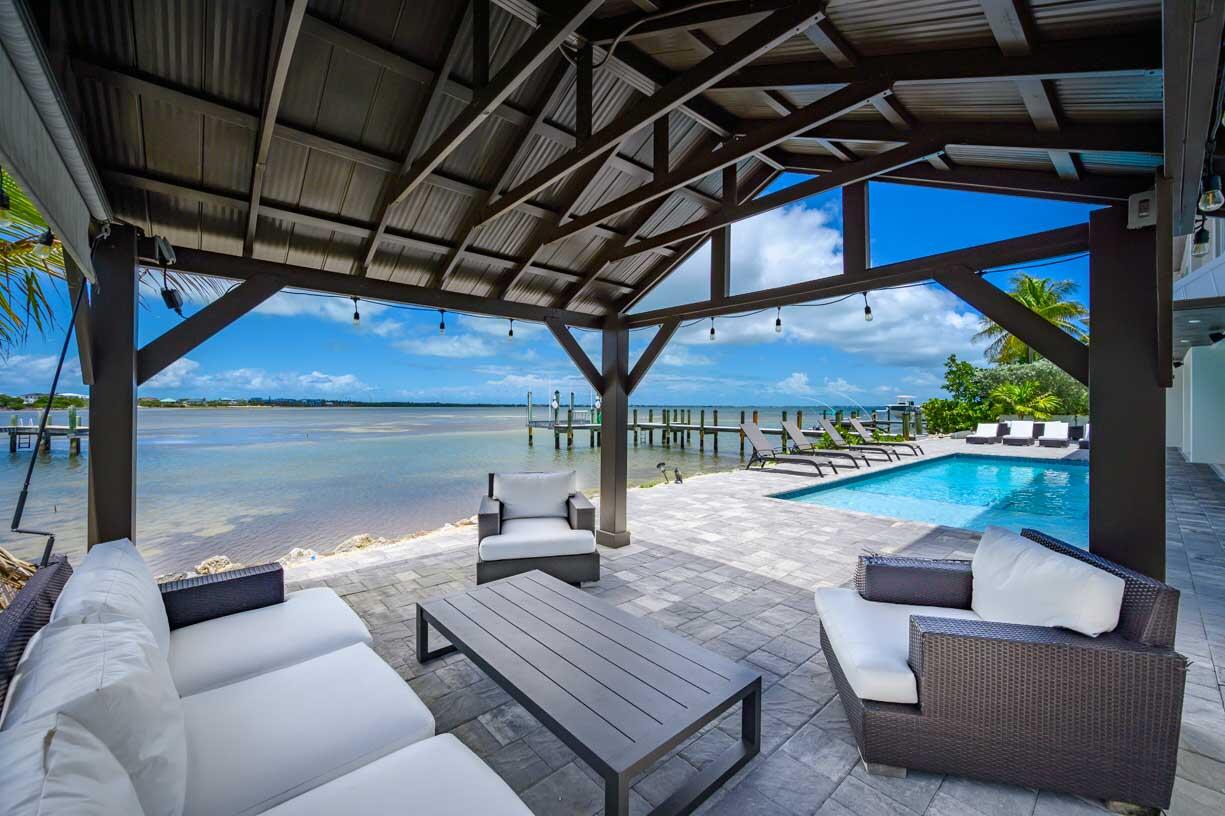 14 East Ocean Drive Marathon, FL 33050 - Photo 3 of 48 a outdoor space with patio lots of furniture